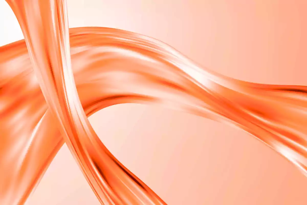 Ondas fluidas de color naranja brillante sobre un fondo del mismo tono
