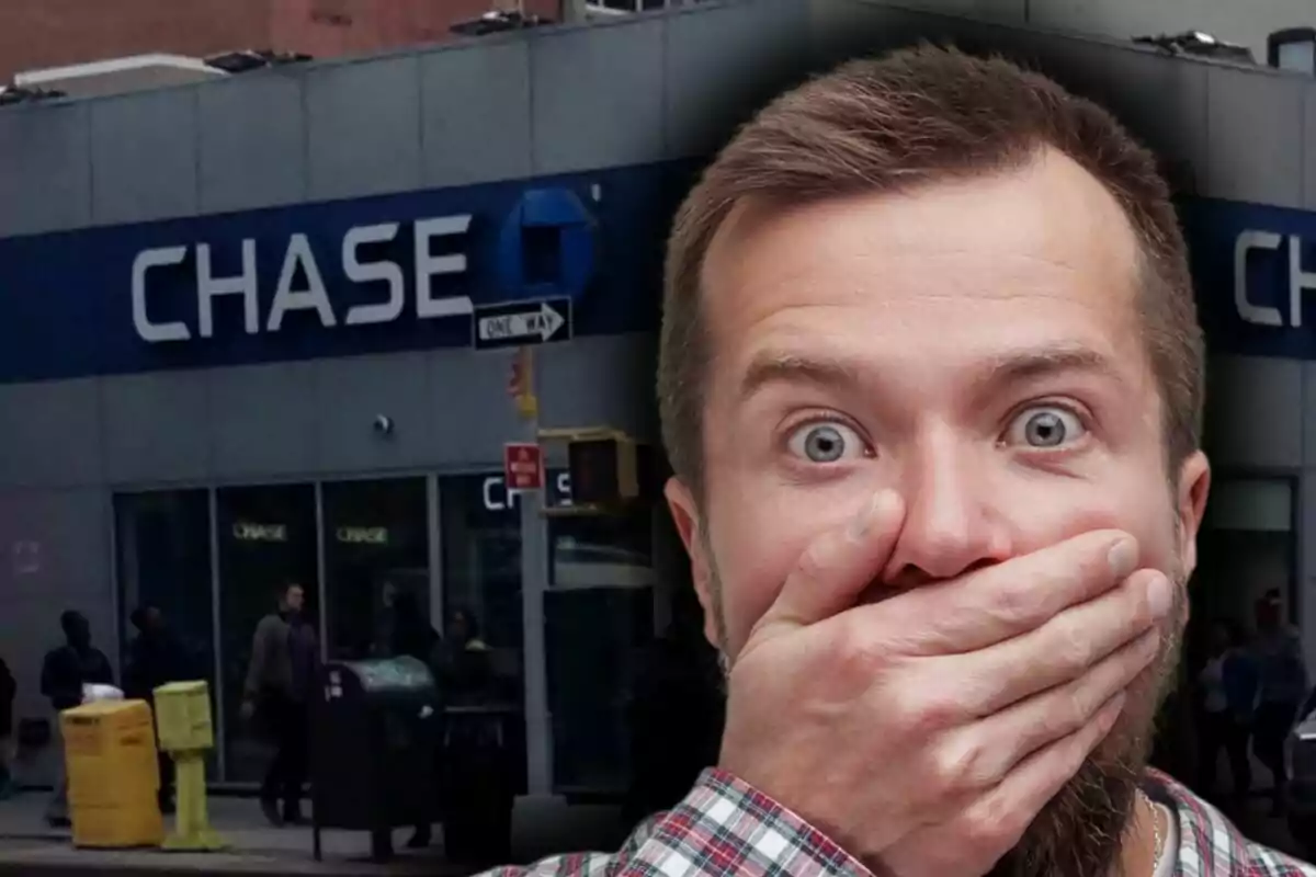 Surprised man covering his mouth in front of a Chase bank branch.