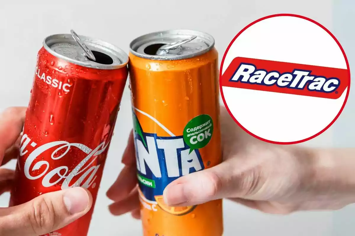 Two hands clink cold cans of Coca-Cola and Fanta next to the RaceTrac logo Two hands clink cold cans of Coca-Cola and Fanta next to the RaceTrac logo