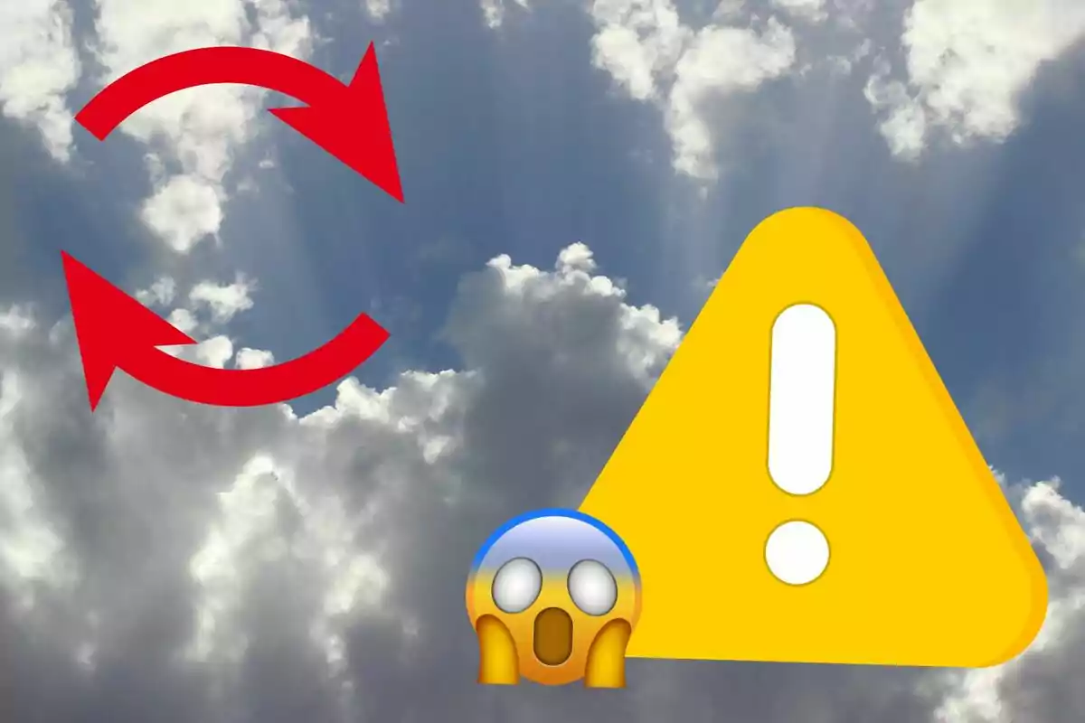 Nubes en el cielo con flechas rojas de recarga, un triángulo de advertencia amarillo y un emoji de sorpresa