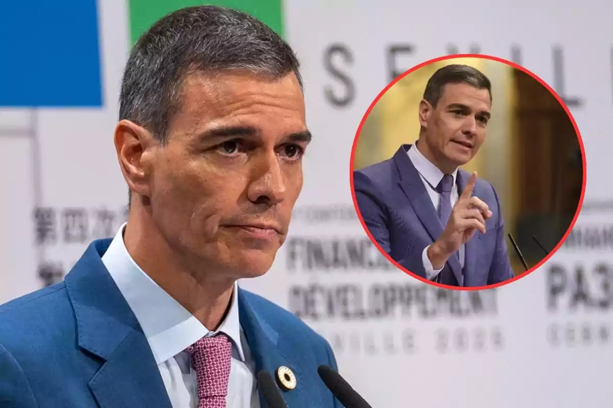 Hombre de cabello corto y canoso con traje azul y corbata rosa hablando en un podio, con un recuadro circular mostrando otra imagen suya levantando el dedo índice mientras habla