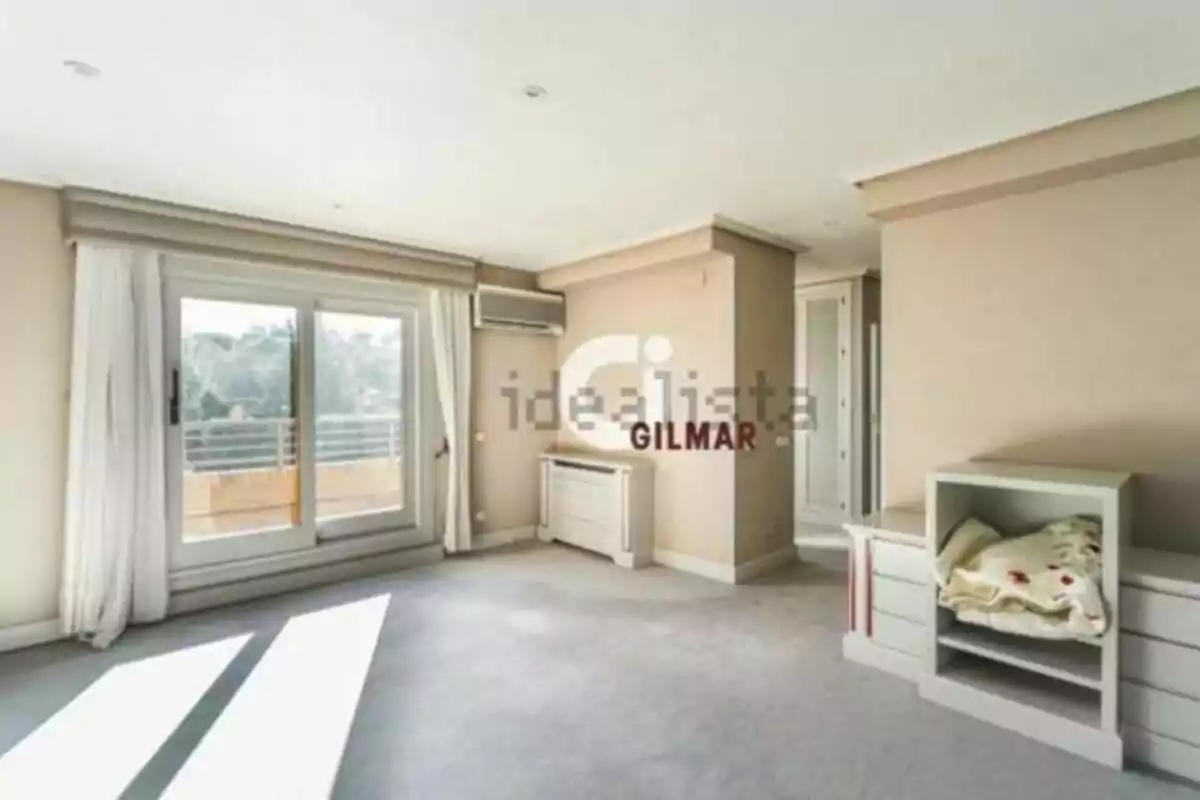 Spacious and bright room with large windows, white curtains, air conditioning, and white furniture along the wall. Spacious and bright room with large windows, white curtains, air conditioning, and white furniture along the wall.