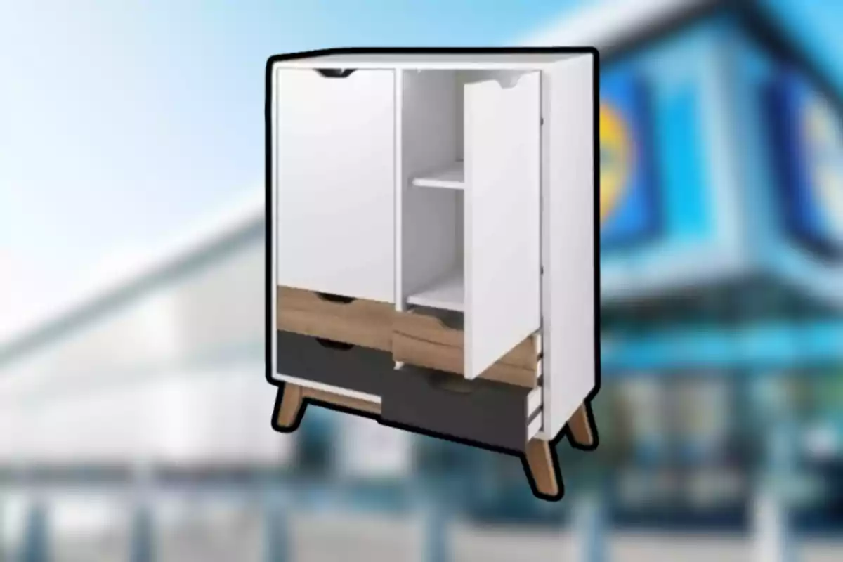 Mueble blanco con puertas y cajones de madera y negro sobre fondo desenfocado de una tienda Mueble blanco con puertas y cajones de madera y negro sobre fondo desenfocado de una tienda