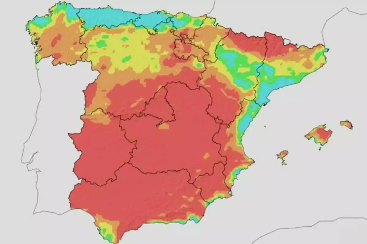 Mapa de España con diferentes zonas coloreadas en rojo, amarillo, verde, azul y naranja que representan distintas áreas climáticas o de temperatura Mapa de España con diferentes zonas coloreadas en rojo, amarillo, verde, azul y naranja que representan distintas áreas climáticas o de temperatura