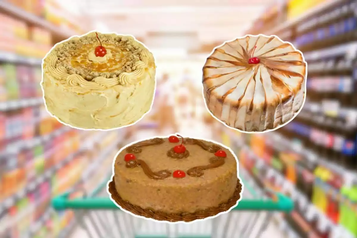 Three cakes decorated with cherries on a blurred supermarket background