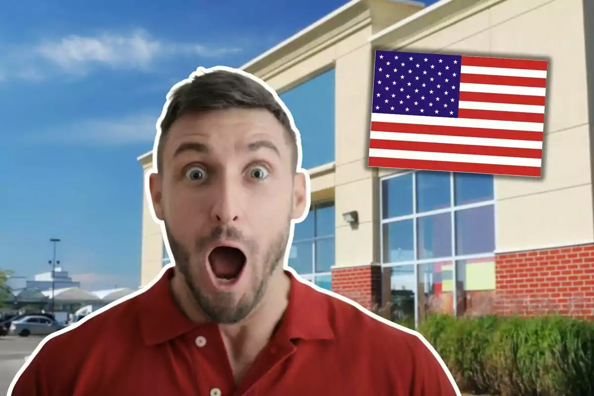 Man with a surprised expression in front of a building and a United States flag