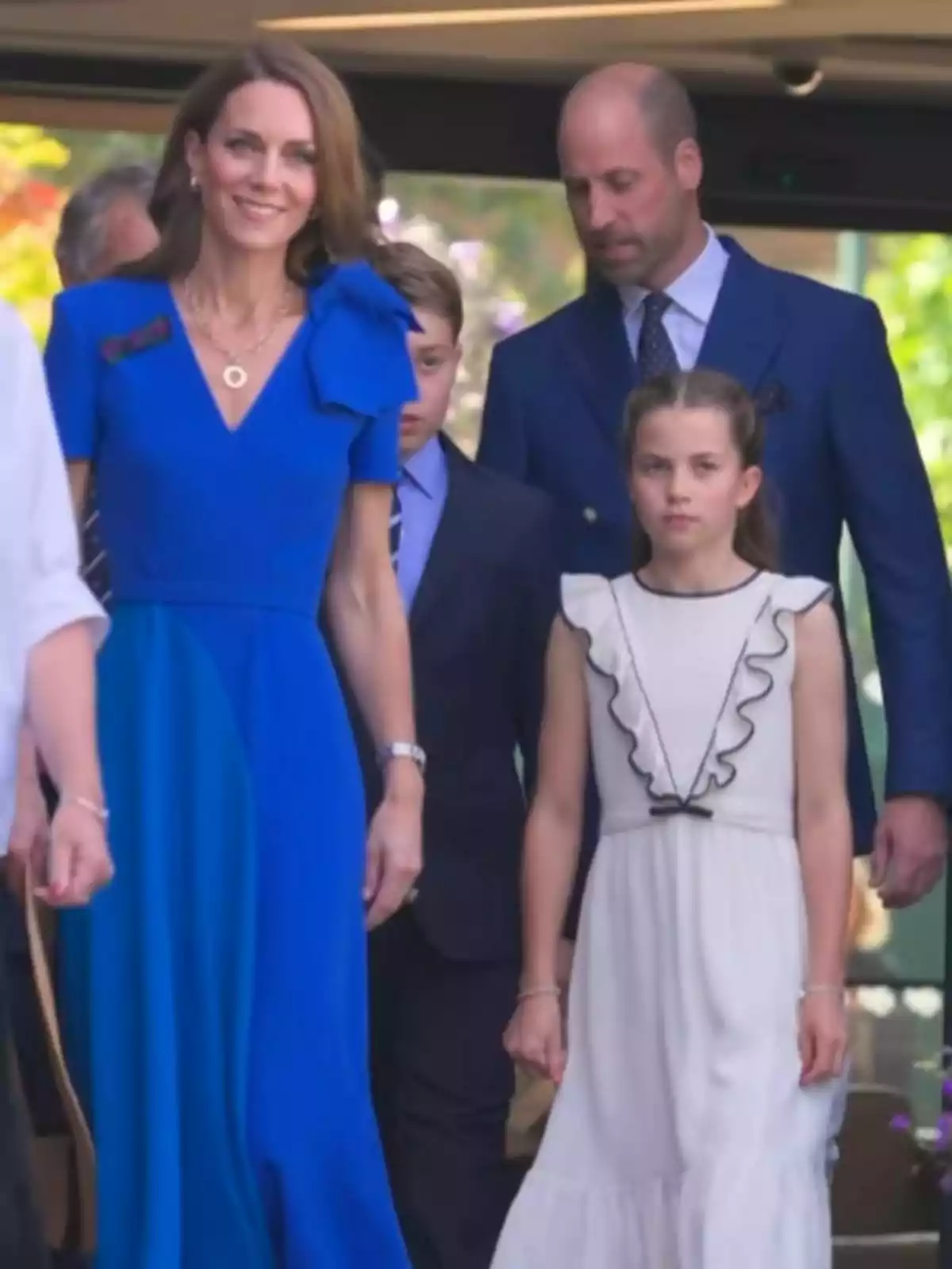 Princess Charlotte, Prince George, Kate Middleton, and Prince William at Wimbledon.