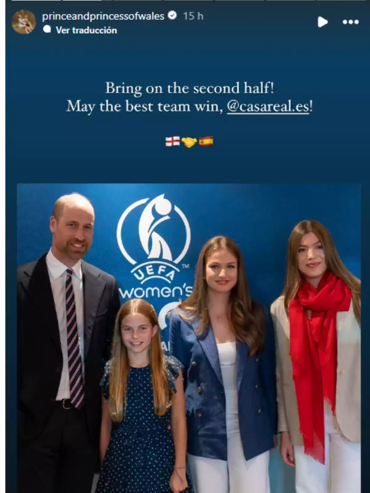 Four people pose smiling in front of a blue background with the UEFA Women's Euro logo. Four people pose smiling in front of a blue background with the UEFA Women's Euro logo.