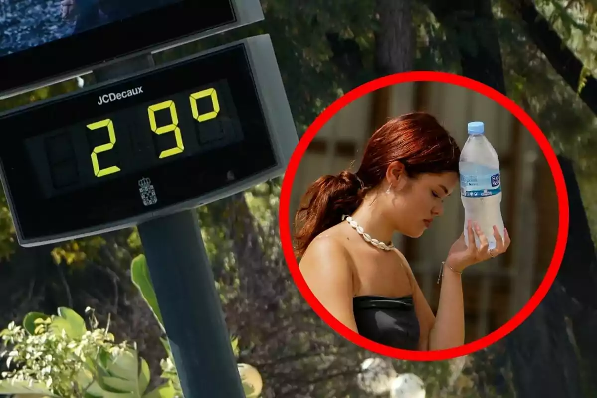 Un termómetro en la calle marca 29 grados mientras una mujer se refresca con una botella de agua en la frente
