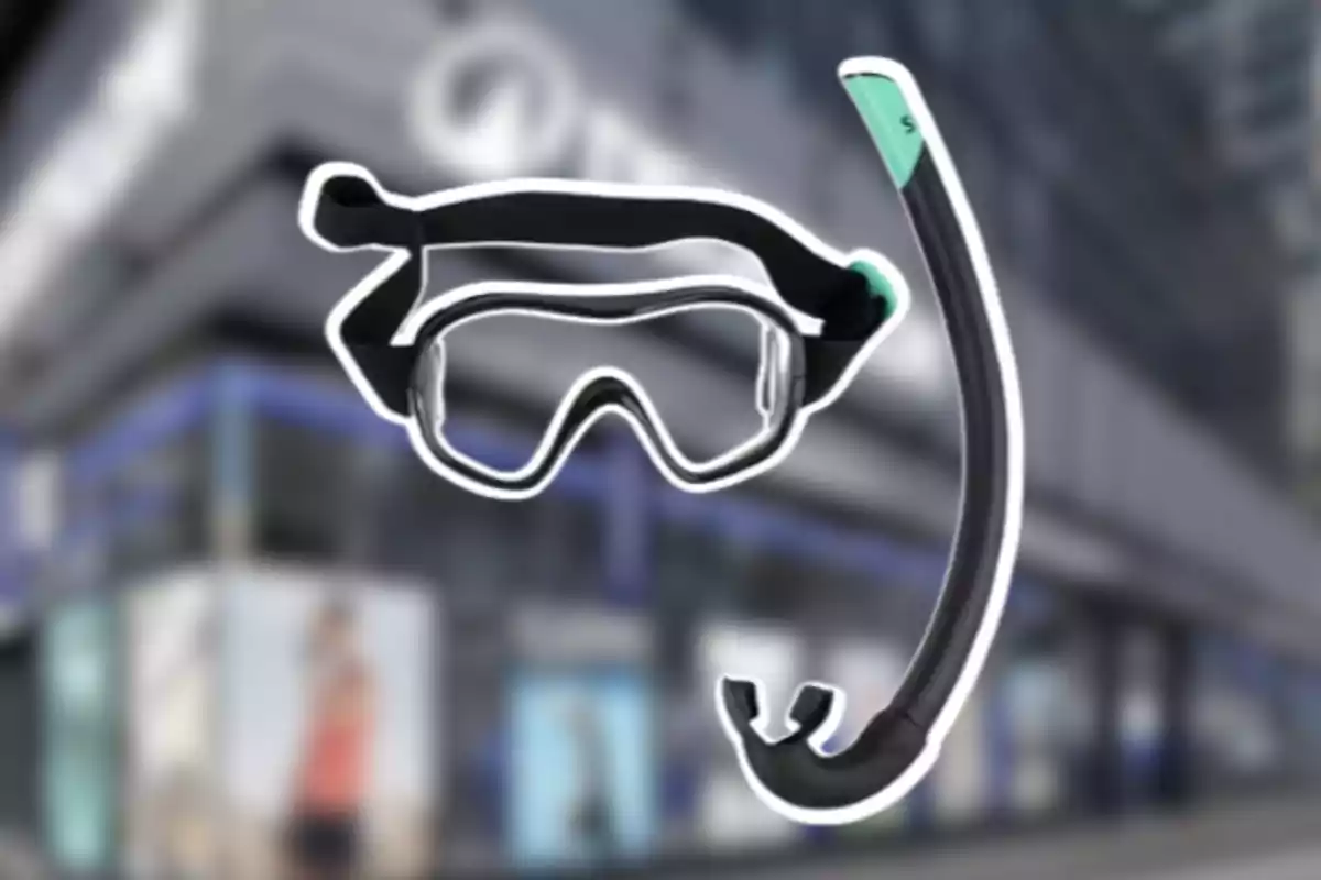 Un visor y un snorkel de buceo con fondo de edificio desenfocado Un visor y un snorkel de buceo con fondo de edificio desenfocado