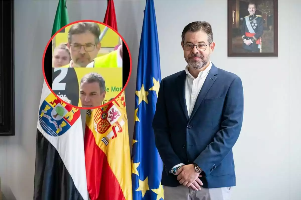 Un hombre con gafas y barba posa junto a banderas y un retrato en la pared, mientras un recuadro muestra un acercamiento de su rostro en un evento público.