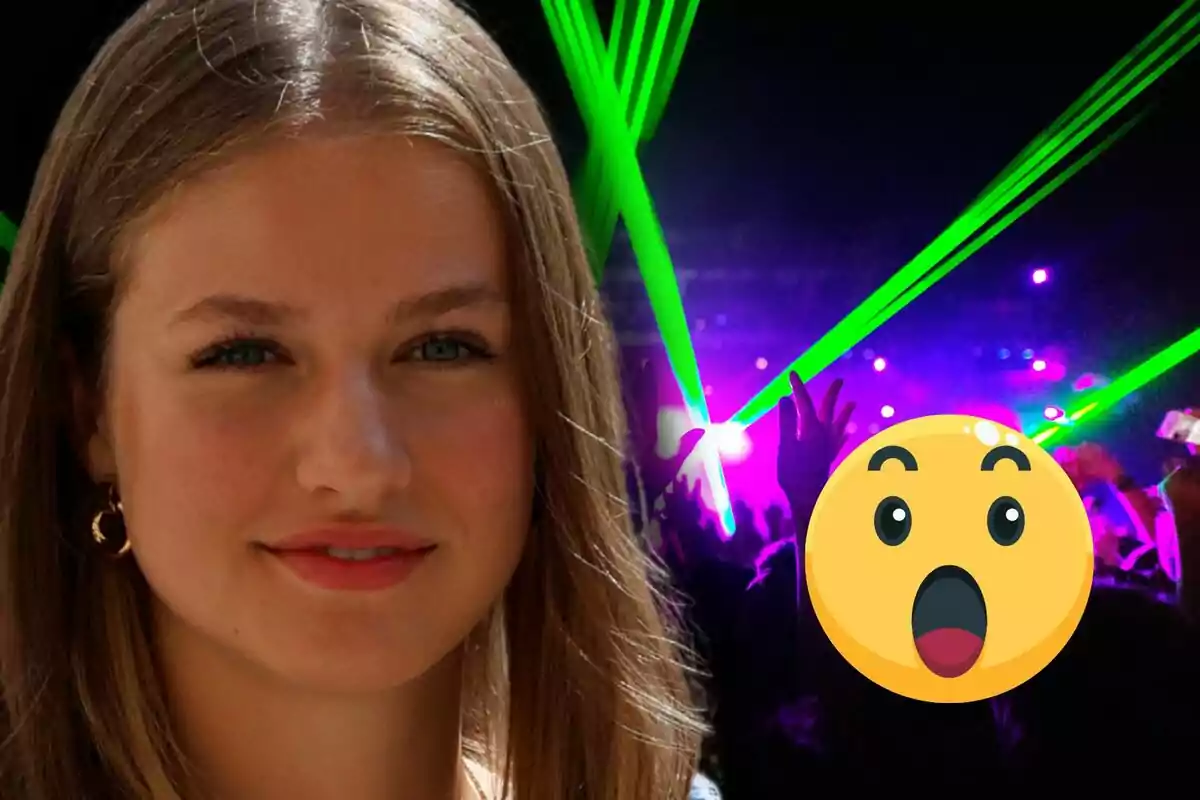 La princesa Leonor sonriente en primer plano con fondo de concierto lleno de luces verdes y púrpuras y un emoji de sorpresa