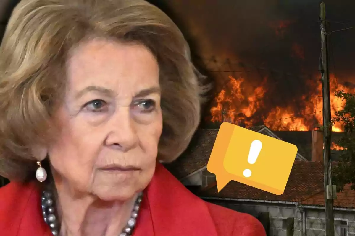 La reina Sofía con expresión seria en primer plano, fondo de incendio y un ícono de advertencia amarillo