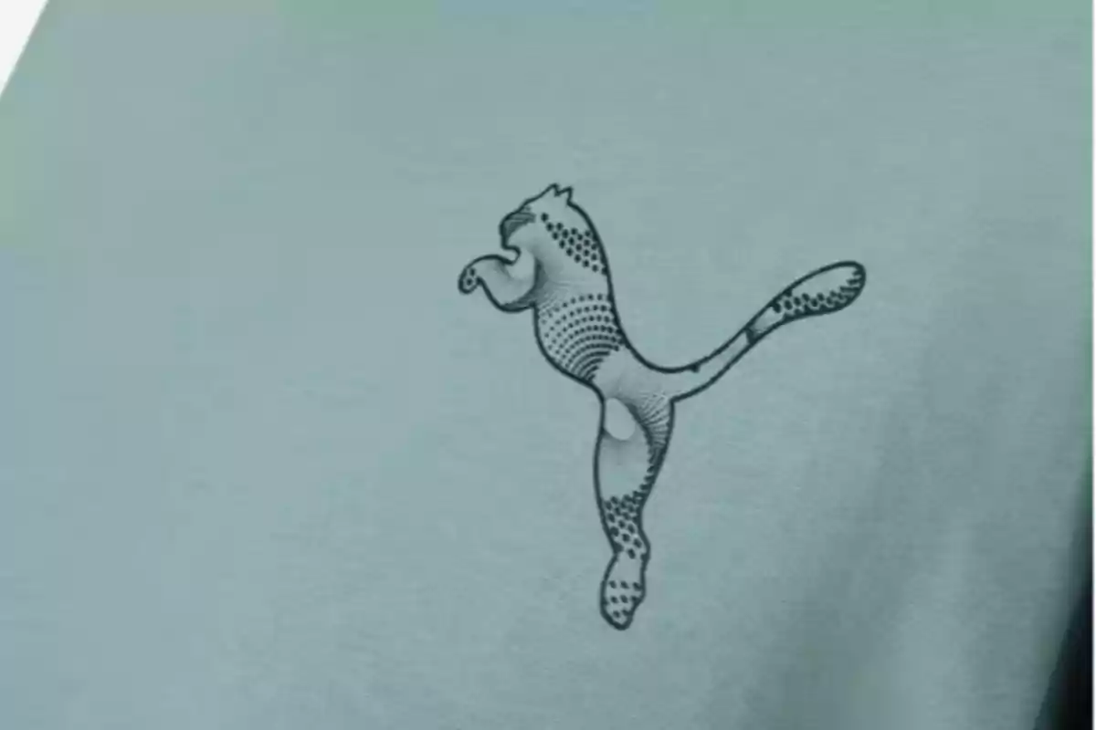 Logo de un felino saltando con diseño de puntos sobre tela color verde claro