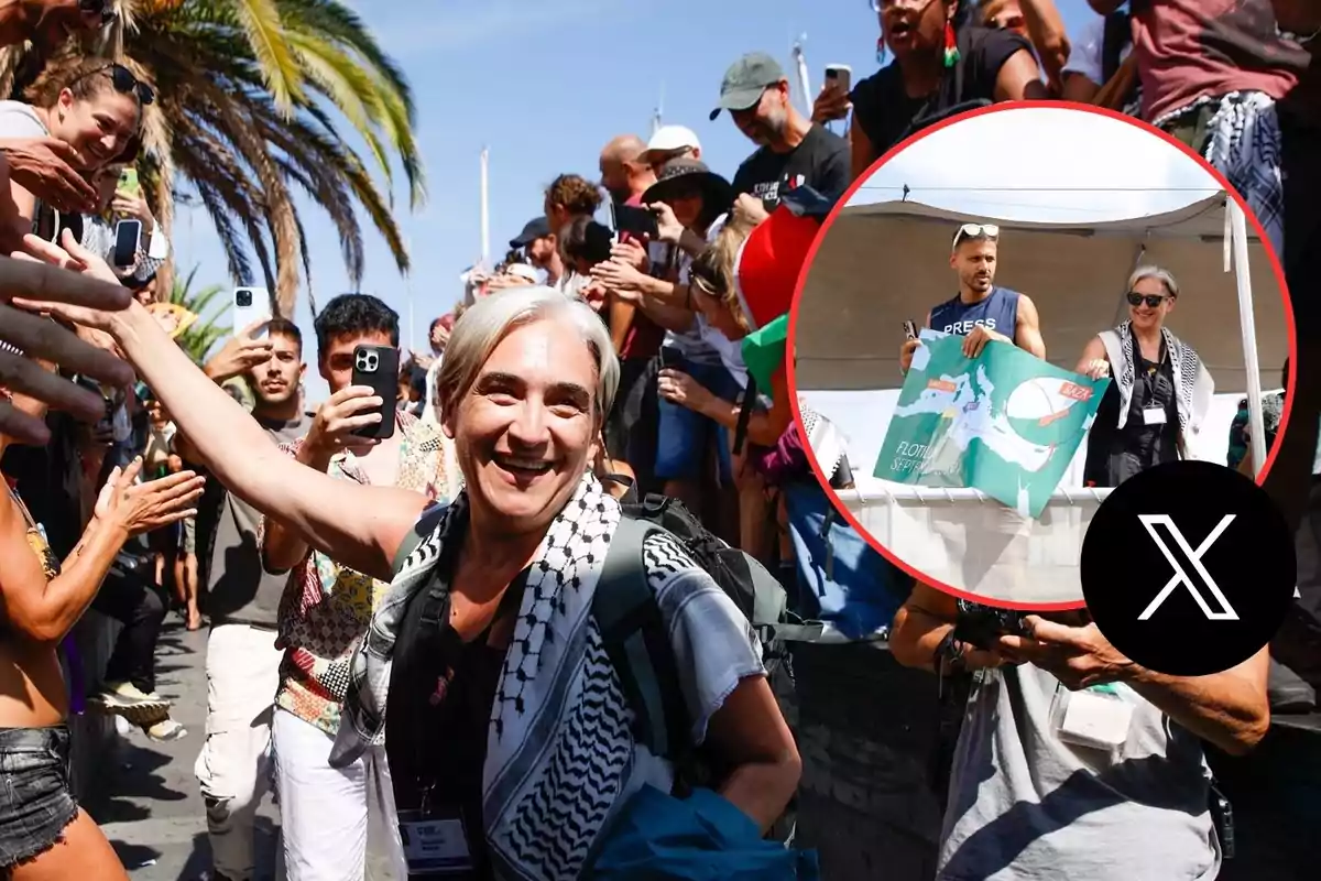 Mujer sonriente con cabello canoso es recibida por una multitud que la saluda y toma fotos mientras camina, en la esquina superior derecha hay un recuadro con dos personas sosteniendo un cartel y el logo de X