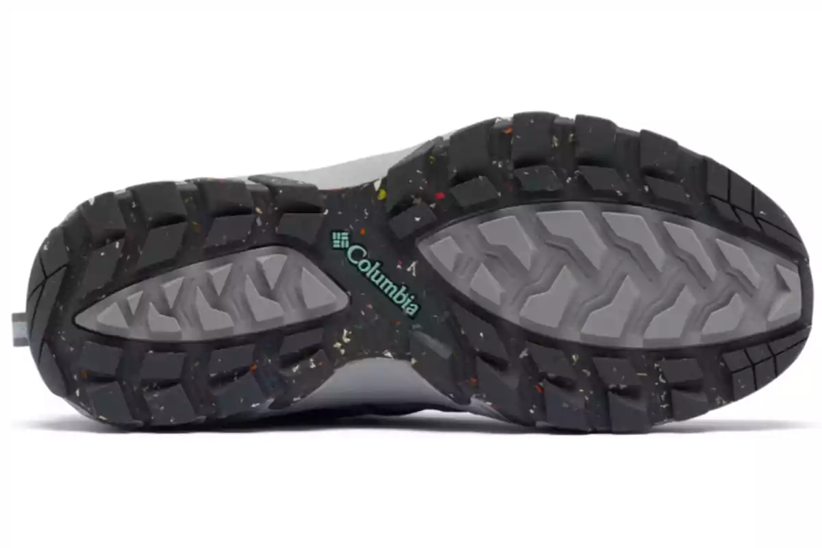 Suela de zapato deportivo Columbia con diseño de agarre y detalles en color gris y negro Suela de zapato deportivo Columbia con diseño de agarre y detalles en color gris y negro