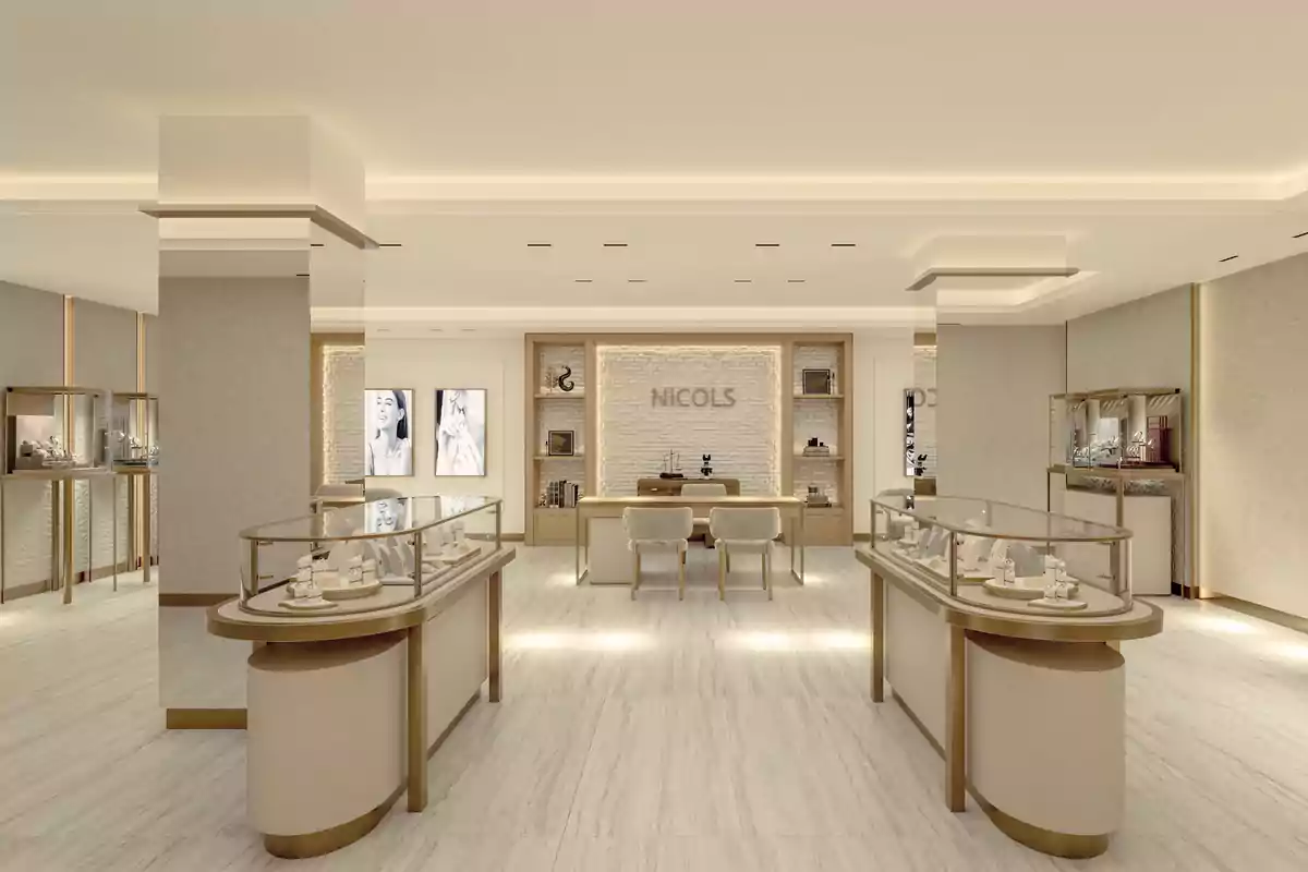 Joyería elegante con vitrinas de exhibición de lujo, decoración en tonos beige y dorado, y un ambiente moderno y sofisticado