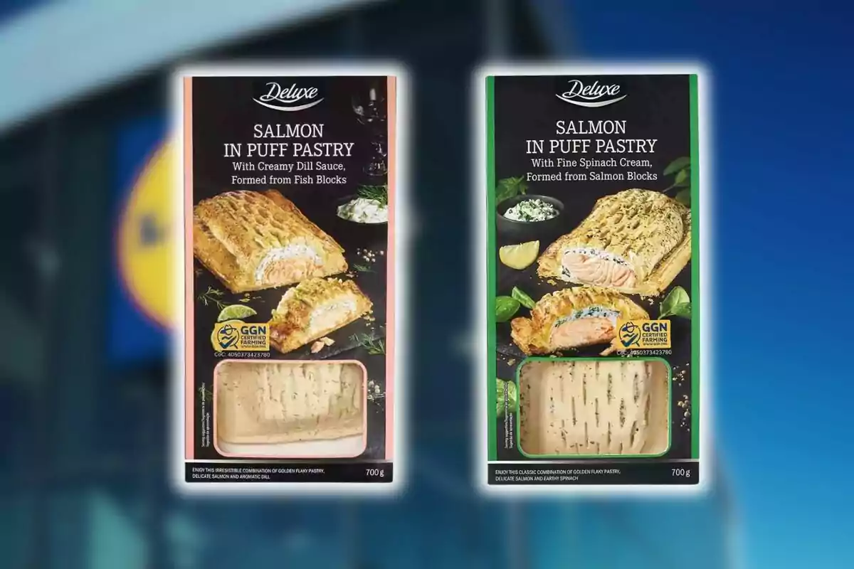 Dos cajas de salmón en hojaldre de la marca Deluxe de Lidl, una con salsa de eneldo y otra con crema de espinacas, ambas con una ventana que muestra el producto en su interior sobre un fondo desenfocado.