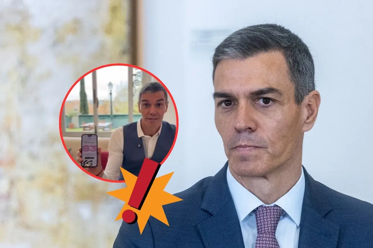 Hombre de cabello canoso con expresión seria vistiendo traje y corbata, acompañado de un círculo rojo que muestra una imagen suya sosteniendo un teléfono móvil y un icono de exclamación amarilla