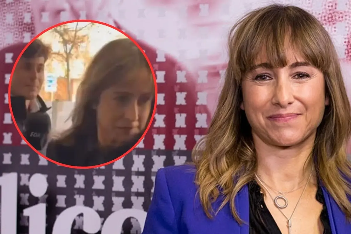 Mujer sonriendo con chaqueta azul frente a un fondo rojo y blanco con un recuadro circular que muestra otra escena borrosa de ella en la esquina izquierda