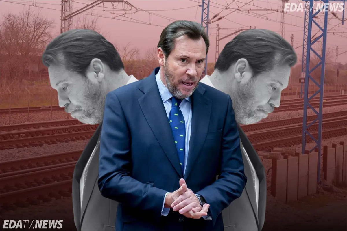 Hombre con traje azul hablando gesticulando frente a unas vías de tren con dos siluetas suyas en blanco y negro de fondo y el logotipo EDATV NEWS en la esquina