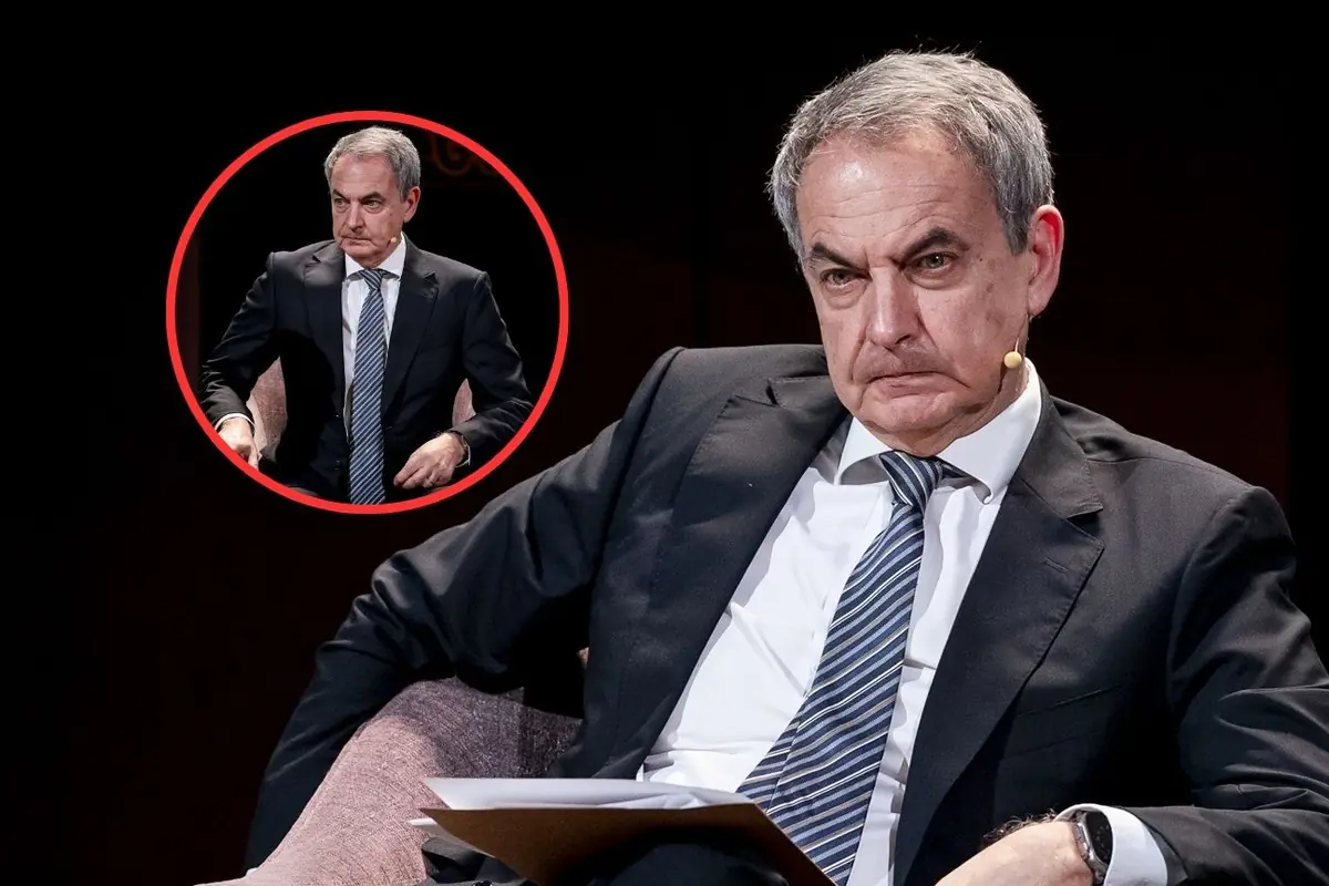 Hombre de mediana edad con traje oscuro y corbata a rayas sentado en un sillón durante una charla con micrófono en la mejilla y un recuadro circular que muestra otra toma suya en la misma escena