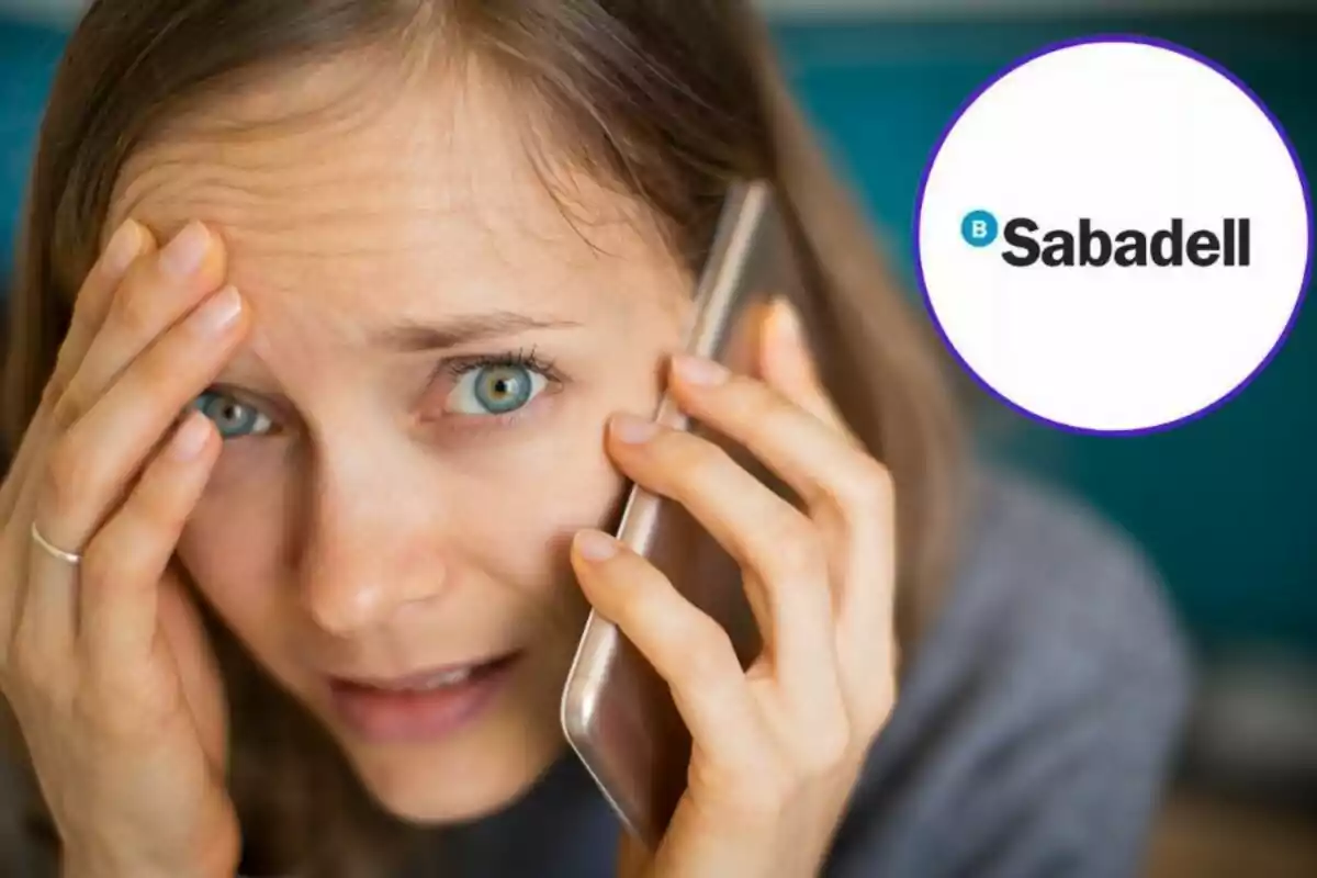 Worried woman talking on the phone with the Sabadell logo in the corner.