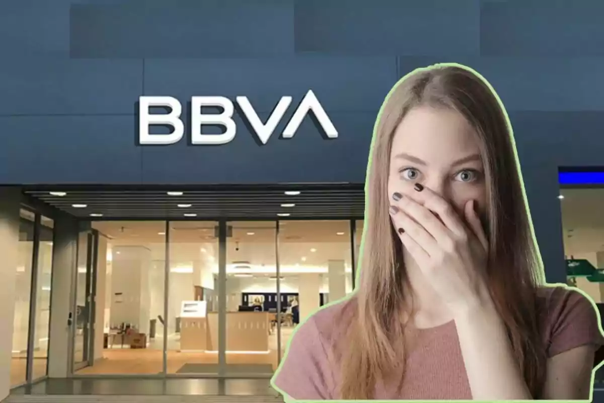 A woman surprised in front of a BBVA bank branch.