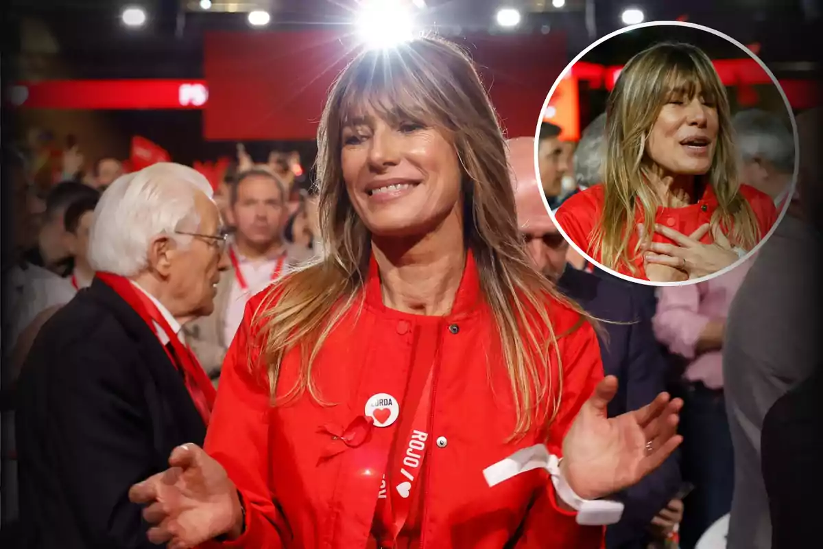Una mujer sonriente con chaqueta roja en un evento rodeada de personas, con un círculo que muestra un primer plano de ella con las manos en el pecho.