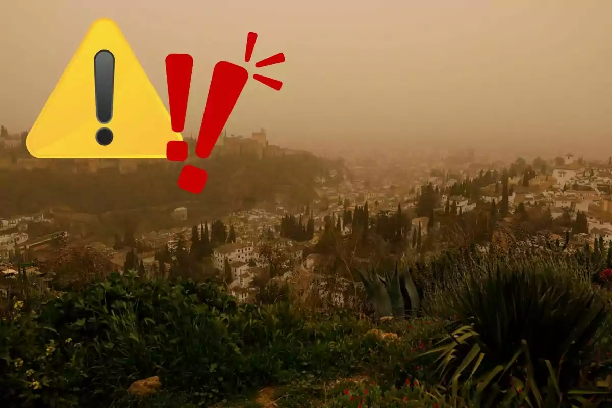 Vista de una ciudad cubierta por una densa capa de polvo con un icono de advertencia superpuesto. Vista de una ciudad cubierta por una densa capa de polvo con un icono de advertencia superpuesto.