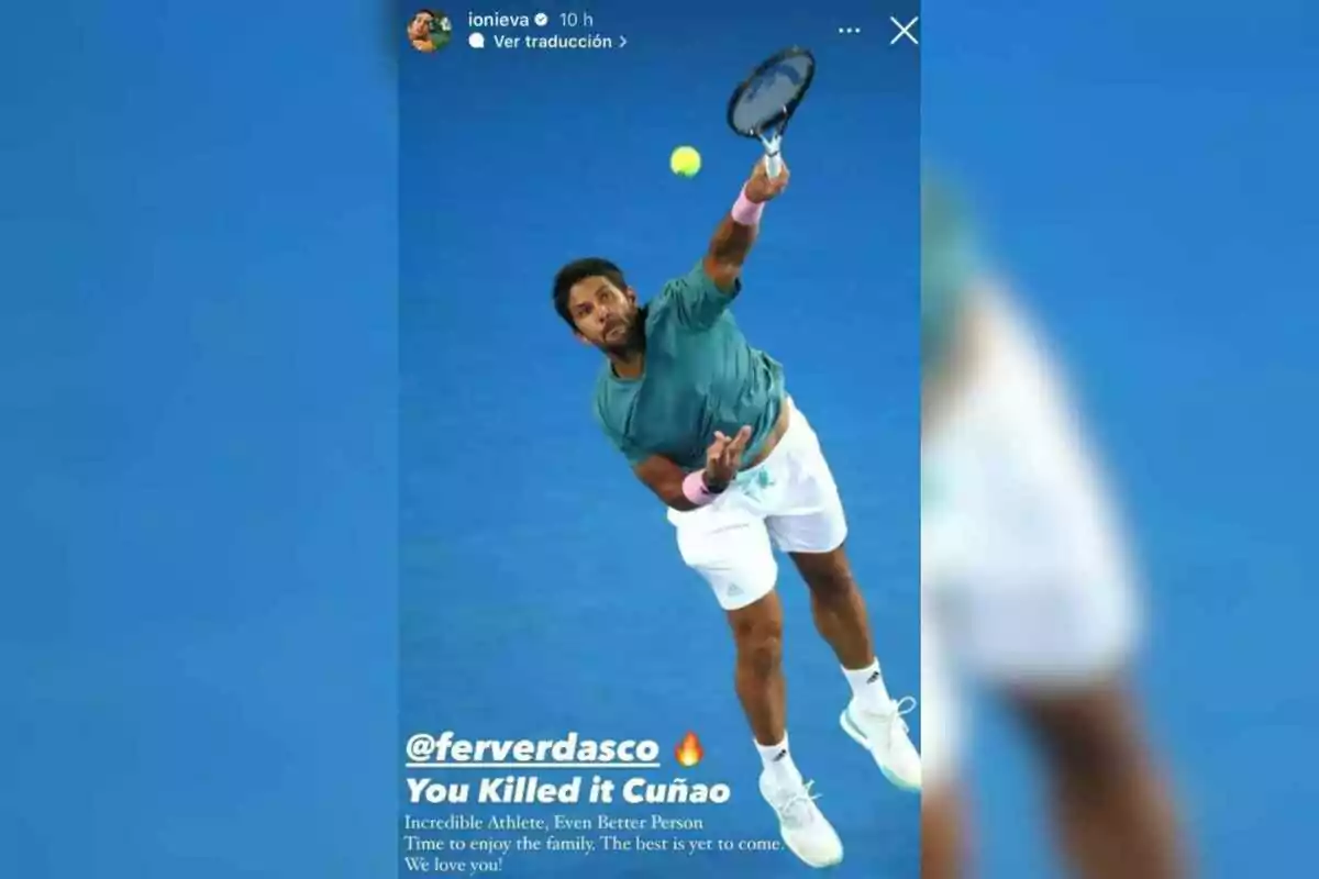 Fernando Verdasco in action during a match, wearing a green jersey and white shorts, while serving on a blue-background tennis court.