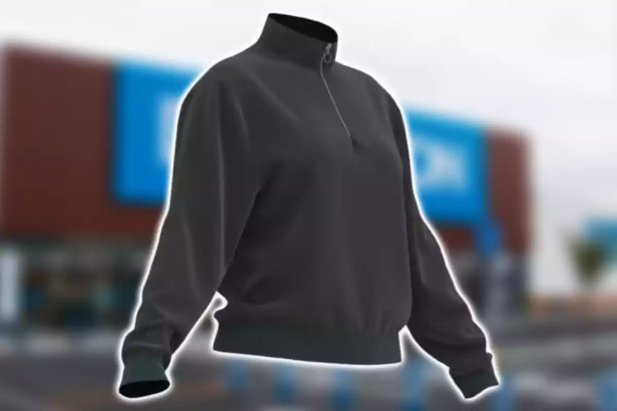 Una sudadera negra con cremallera en un fondo desenfocado. Una sudadera negra con cremallera en un fondo desenfocado.