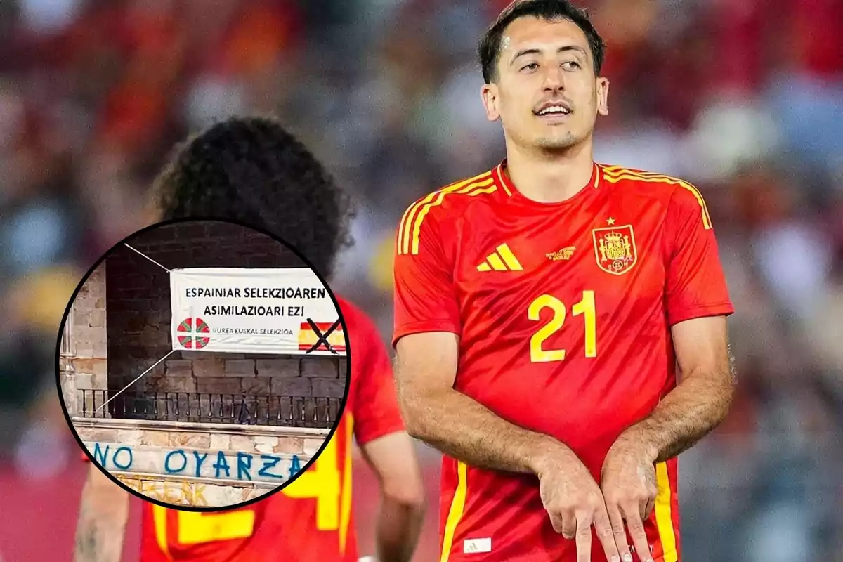 Un jugador de fútbol con el uniforme de la selección española está en el campo, mientras que en la esquina inferior izquierda se muestra un cartel en euskera que dice "Espainiar selekzioaren asimilazioari ez!" y "Gurea Euskal Selekzioa".