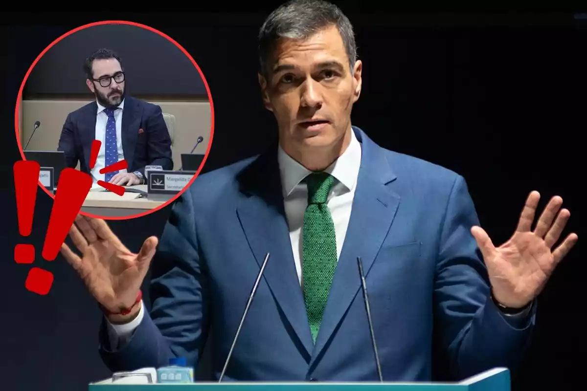 Un hombre en traje azul con corbata verde gesticula mientras habla en un podio con una imagen insertada de otro hombre con gafas y traje oscuro en un círculo rojo con signos de exclamación.