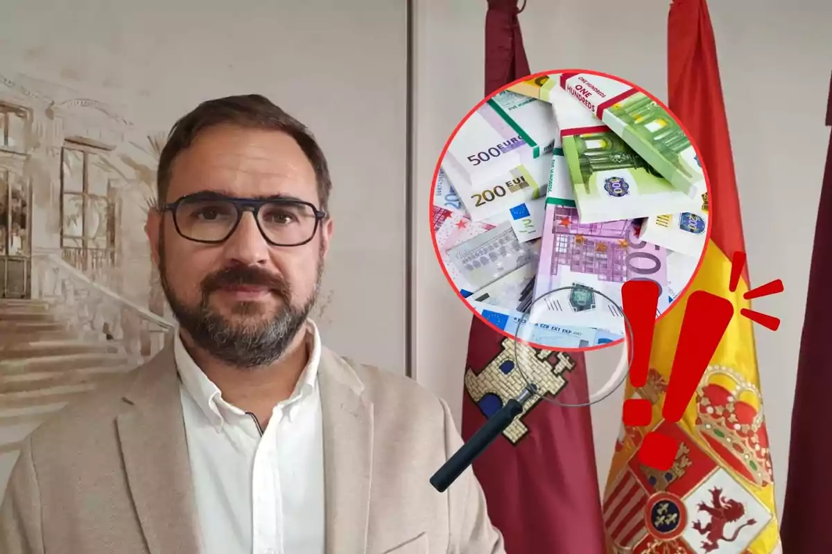 Un hombre con barba y gafas está de pie frente a una pared con una pintura de un edificio, a su lado hay dos banderas y un gráfico circular que muestra billetes de euro y un signo de exclamación.