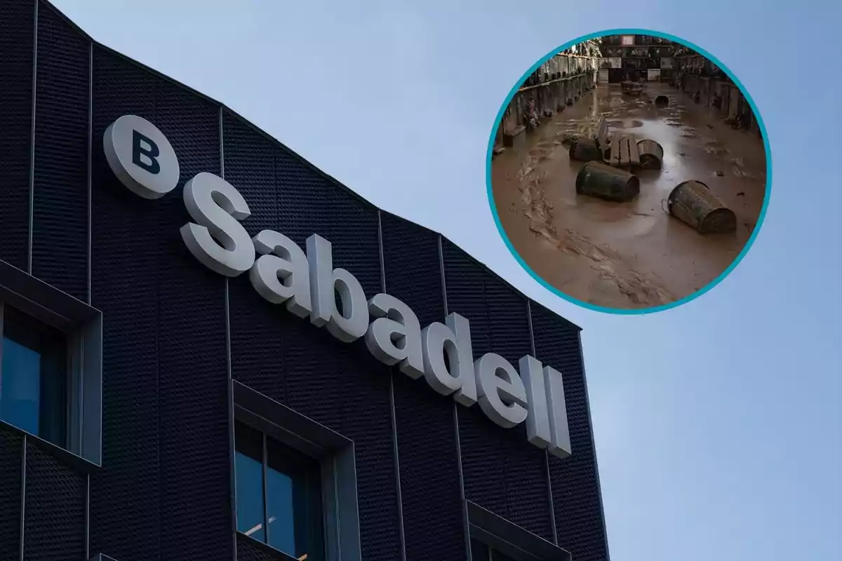 Edificio del Banco Sabadell con un recuadro que muestra un cementerio inundado.