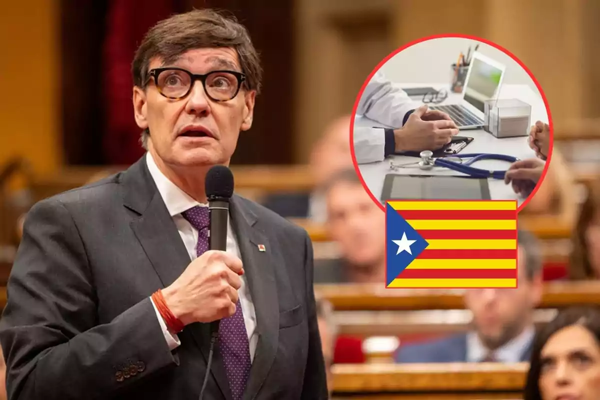 A man with glasses and a suit holds a microphone in a formal setting, with a box showing a medical consultation and a Catalan flag.