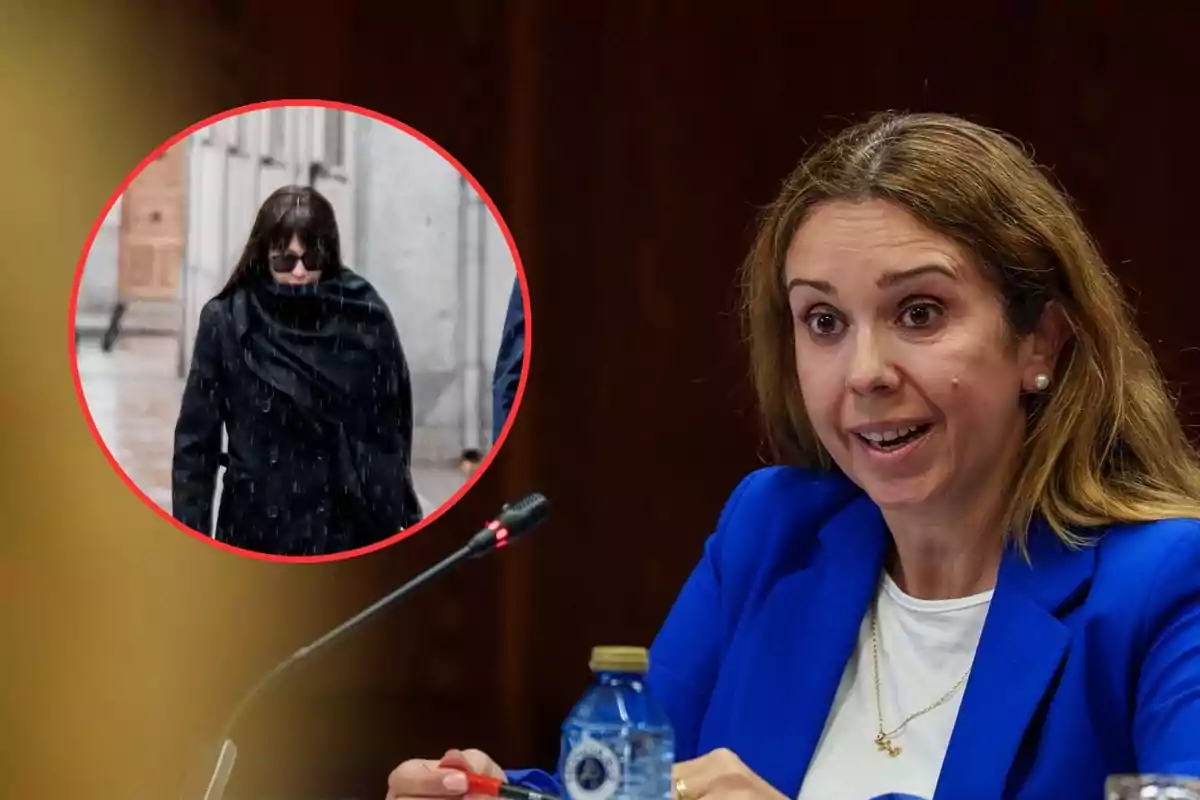 Una mujer con chaqueta azul habla en una reunión mientras en un círculo se muestra a otra persona vestida de negro y con gafas oscuras caminando bajo la lluvia.