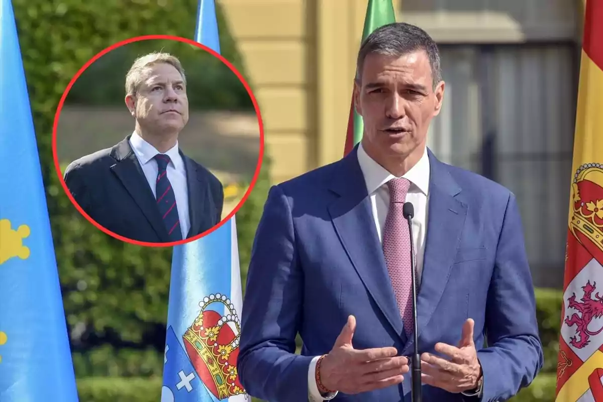 Hombre de traje azul hablando frente a micrófono con banderas de fondo y un círculo rojo mostrando a otro hombre en traje oscuro