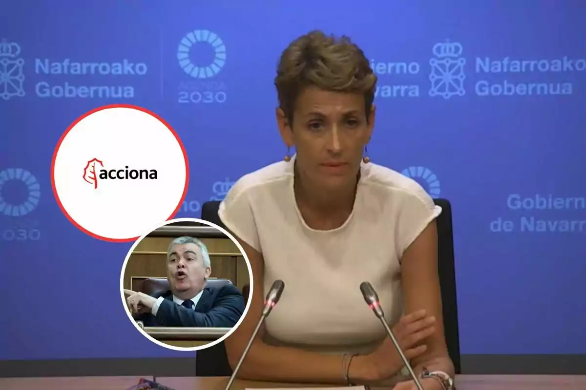 Mujer sentada frente a micrófonos en una rueda de prensa con fondo azul del Gobierno de Navarra y dos círculos superpuestos que muestran el logo de Acciona y un hombre hablando en un estrado