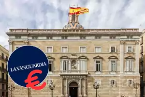 Edificio histórico con una bandera en la parte superior y un logotipo de La Vanguardia en la esquina inferior izquierda.