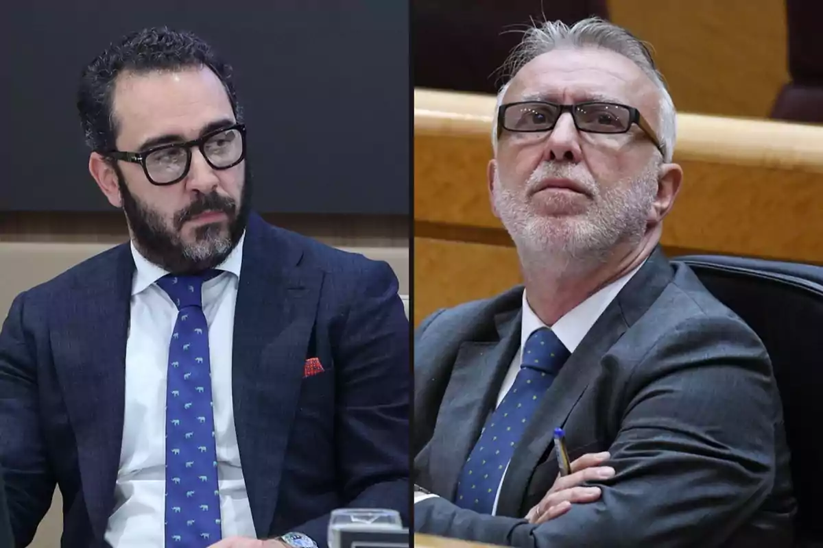 Dos hombres con trajes formales y gafas en un entorno profesional.