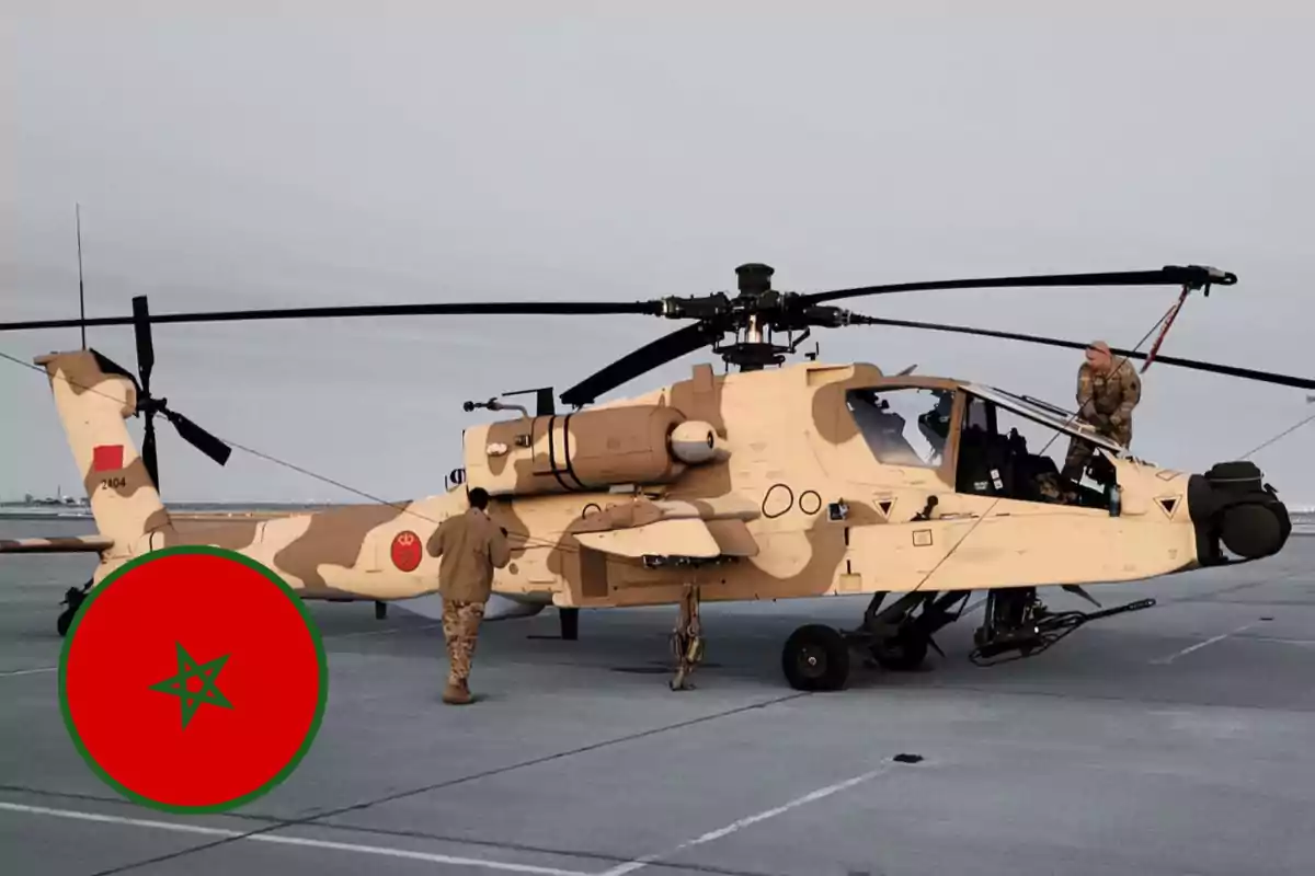 A camouflaged military helicopter on a runway with two people around and a Moroccan flag overlaid in the bottom left corner.