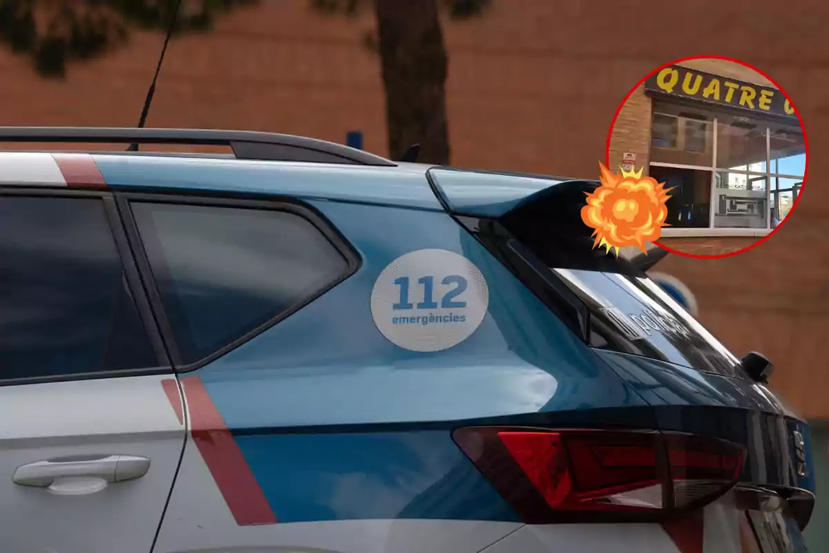 Un coche de emergencias con el número 112 en la puerta trasera y una explosión en una ventana de un edificio en el fondo.