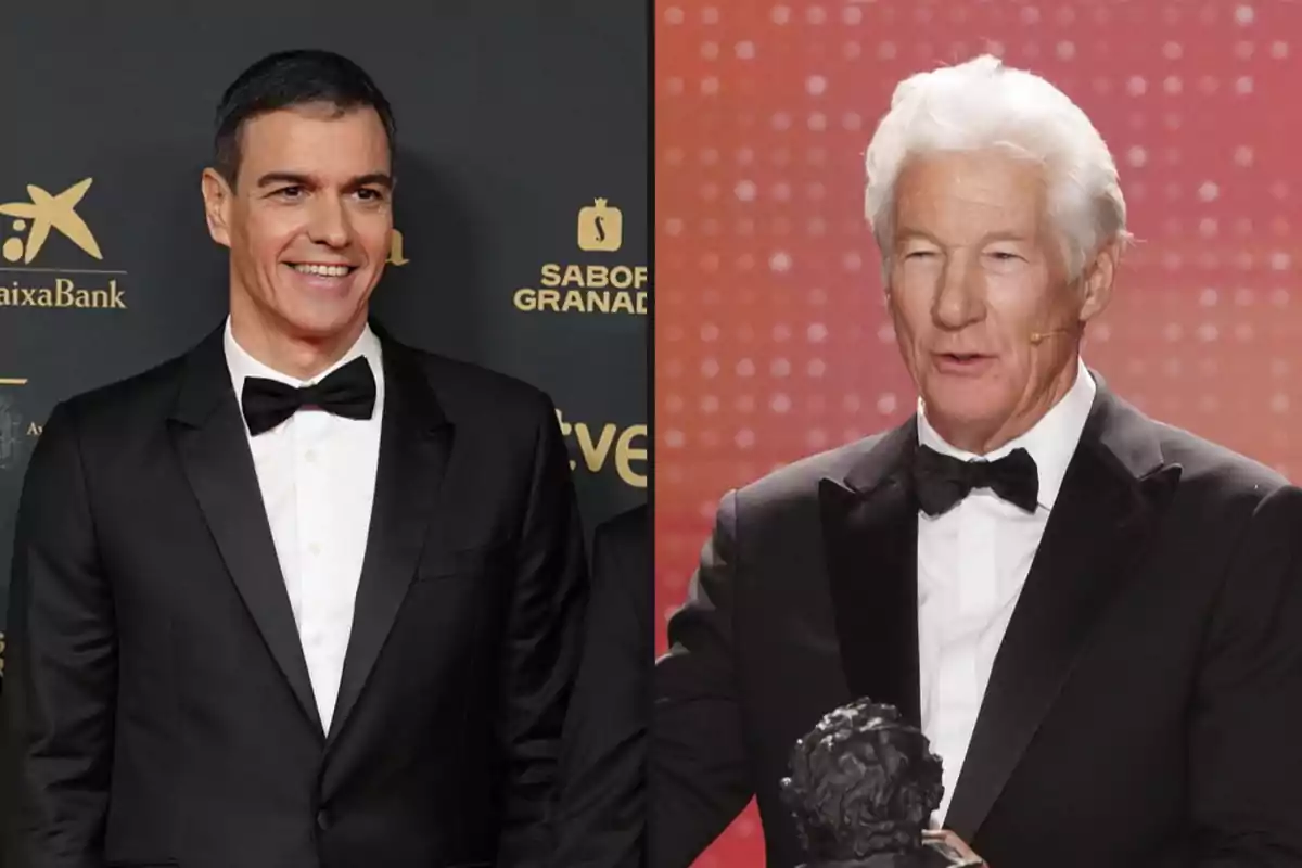 Two men in tuxedos pose at a formal event, one of them holding an award.