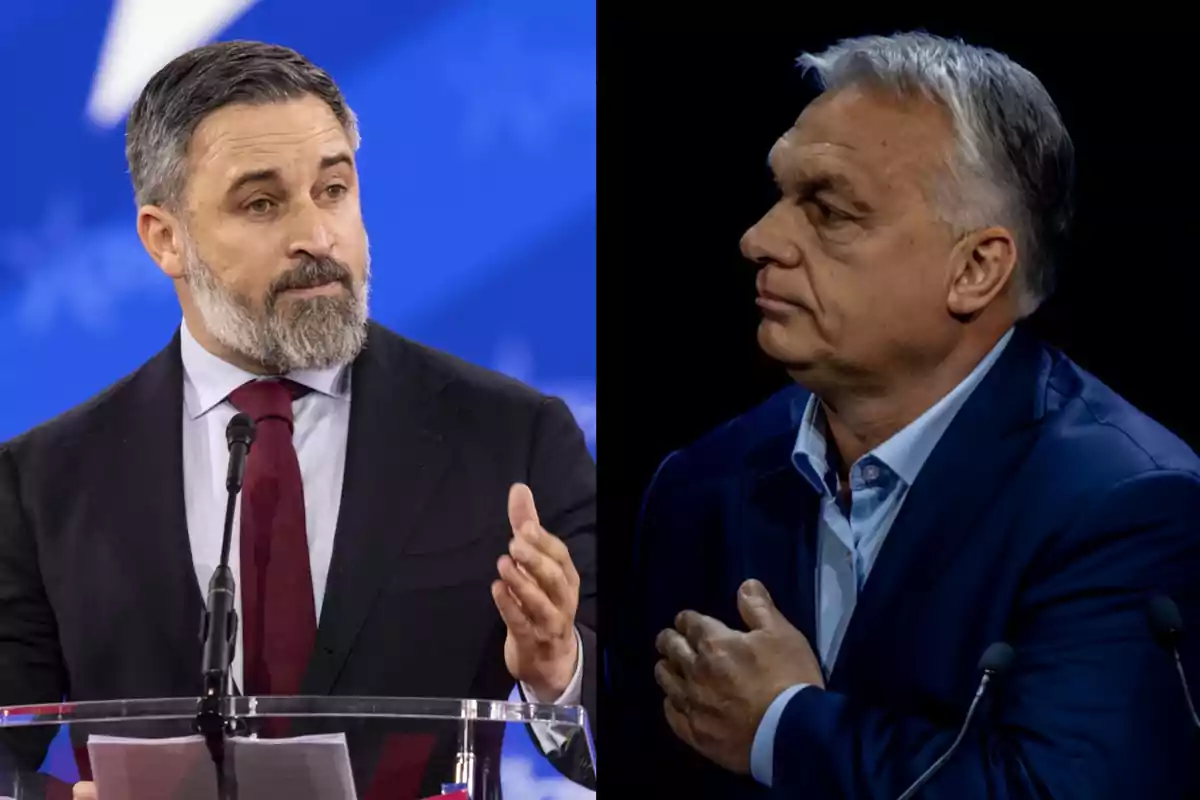 Dos hombres en un evento, uno hablando en un podio y el otro con la mano en el pecho, ambos con trajes formales.
