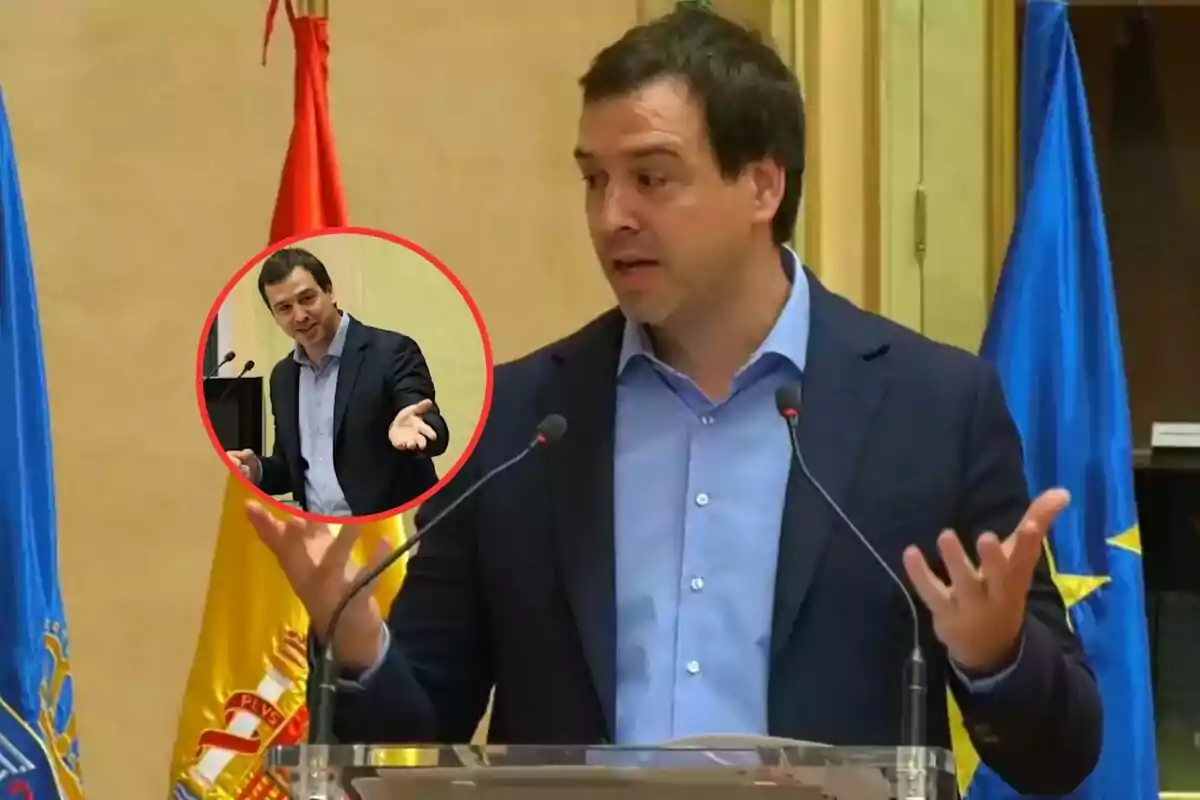 A man speaking at a podium with flags behind him and an inset showing a close-up of him gesturing.