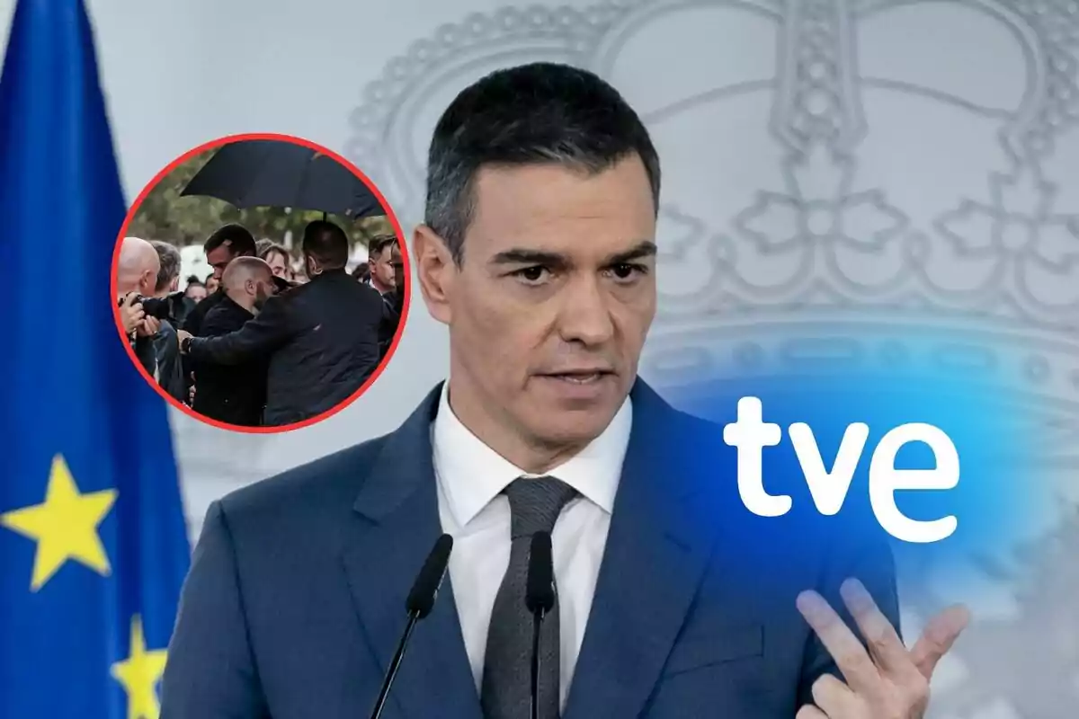 Un hombre en traje habla frente a micrófonos con un fondo que incluye una bandera de la Unión Europea y el logo de TVE; en un círculo rojo se muestra una escena de personas bajo un paraguas.