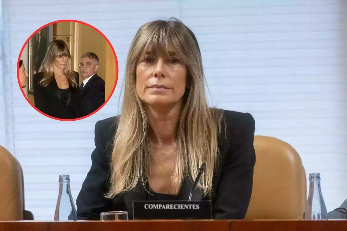 Una mujer con cabello largo y rubio está sentada en una sala de conferencias con una expresión seria; en la esquina superior izquierda hay un recuadro con una imagen de la misma mujer junto a un hombre.