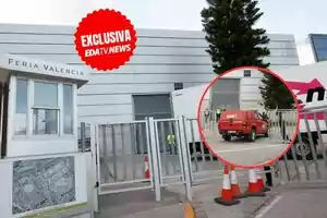 Entrada de la Feria Valencia con un vehículo de la UME y personal de seguridad en el fondo.